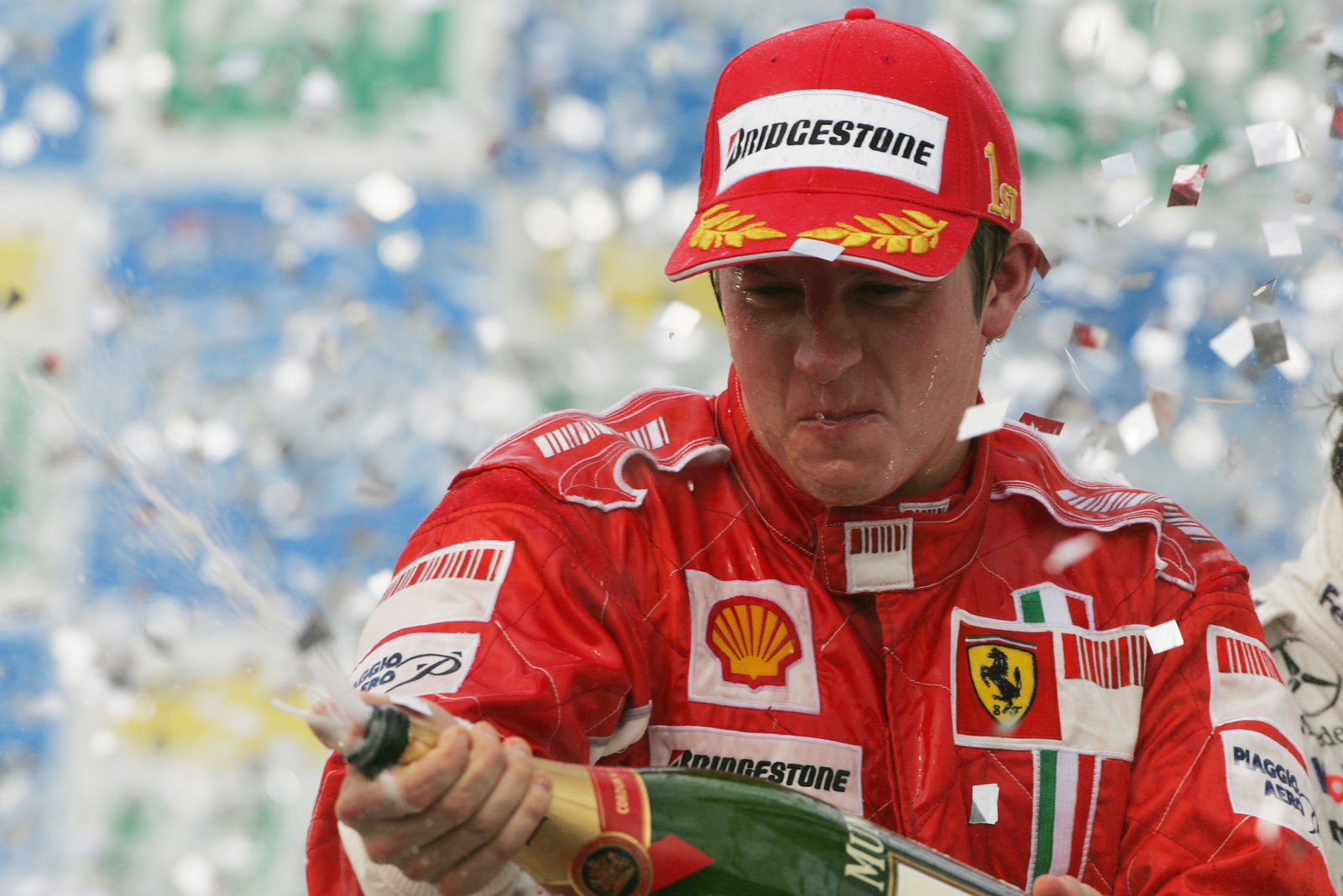 Kimi Raikkonen celebrates winning the 2007 title in Brazil.