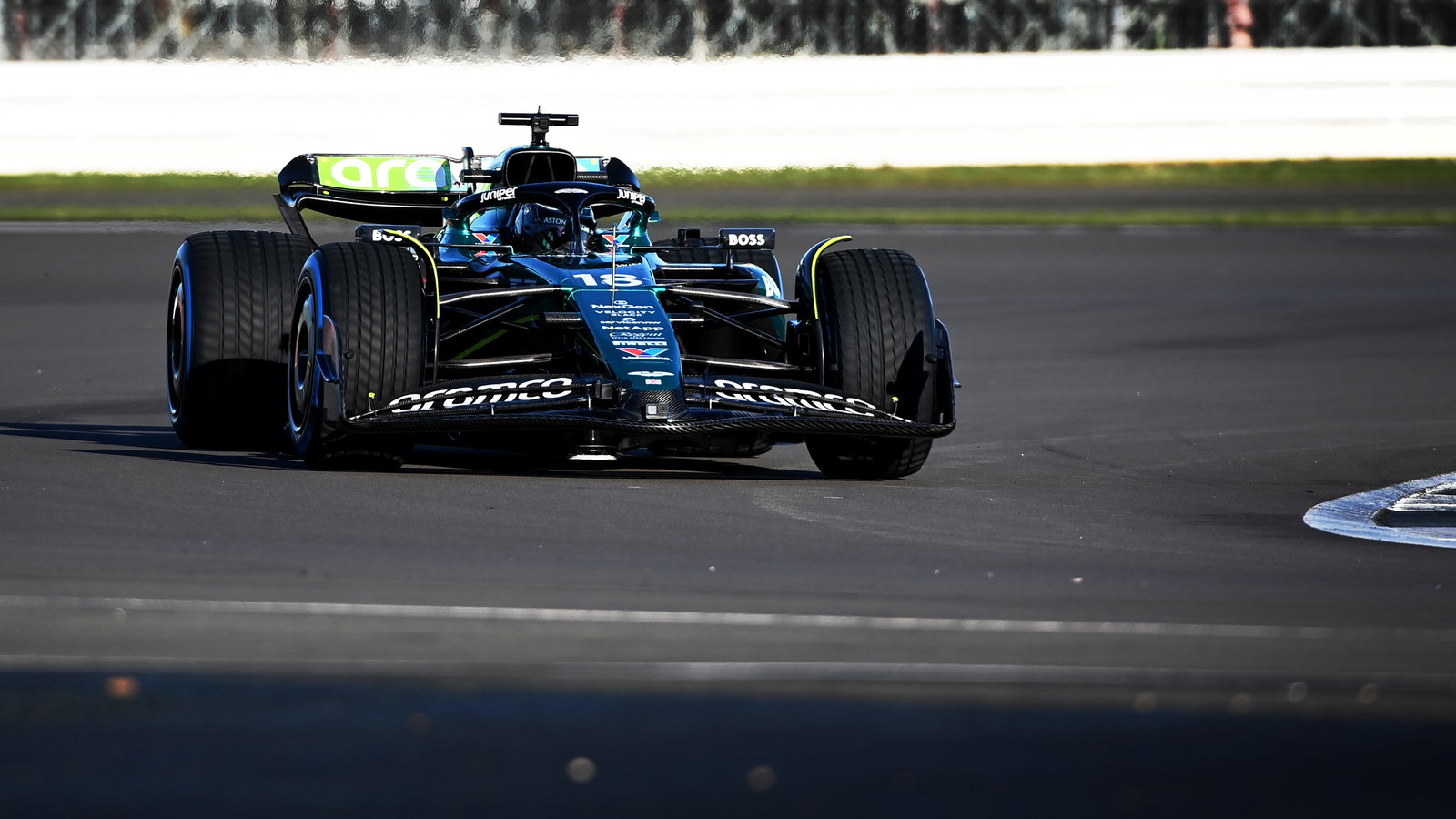 Lance Stroll drives the new Aston Martin AMR24 at Silverstone
