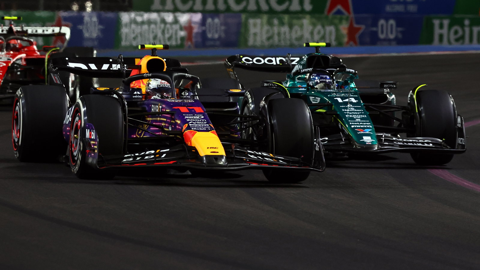 Fernando Alonso battles with Sergio Perez 