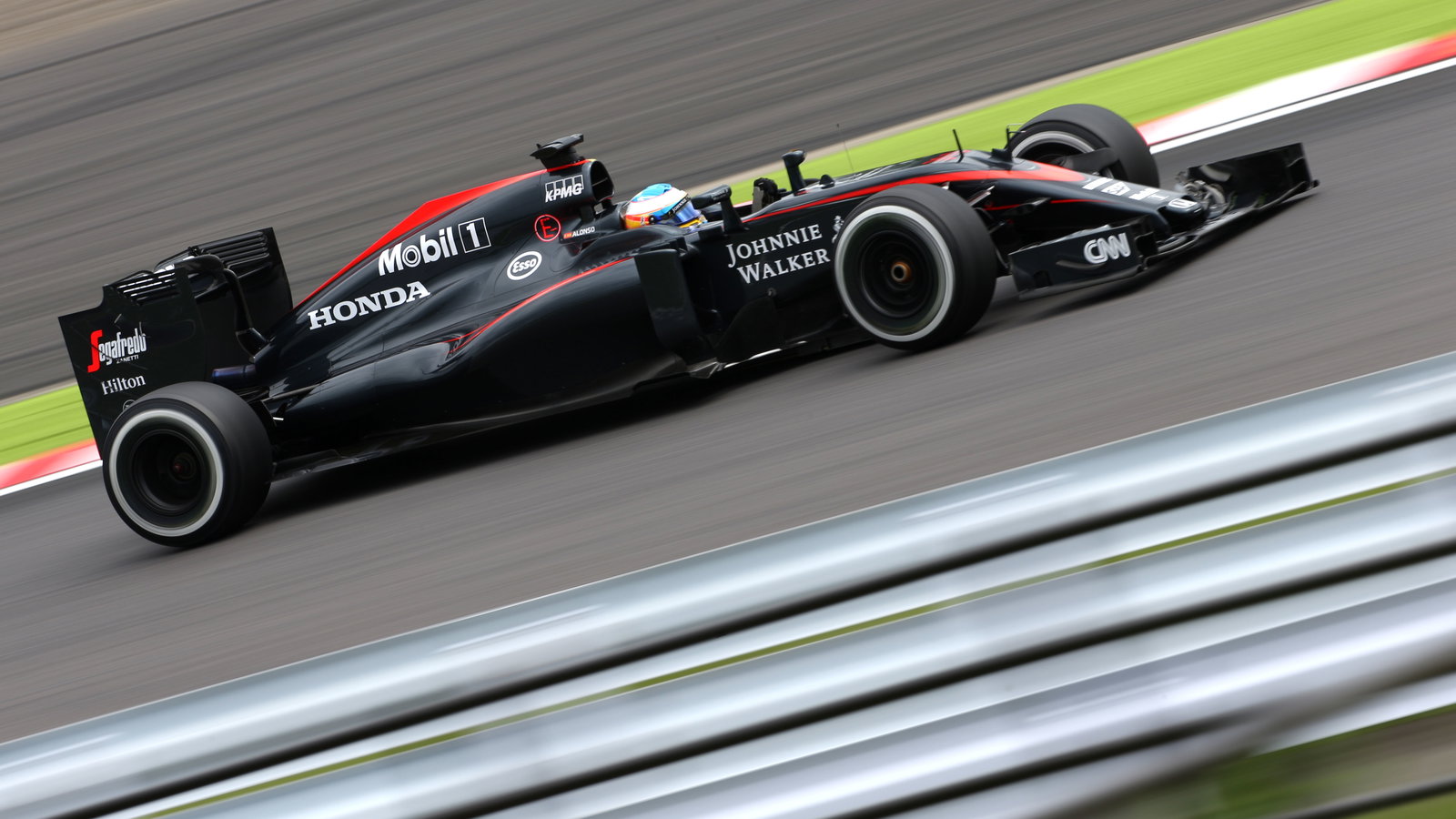 Fernando Alonso driving a Honda-powered McLaren in 2015