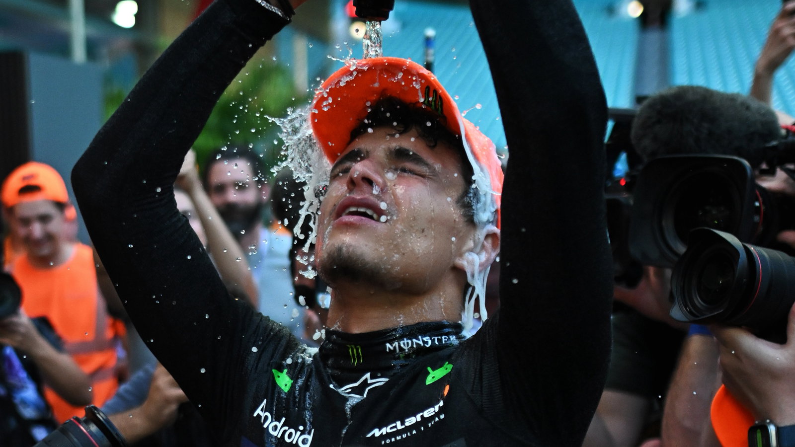 Lando Norris celebrating his maiden F1 win