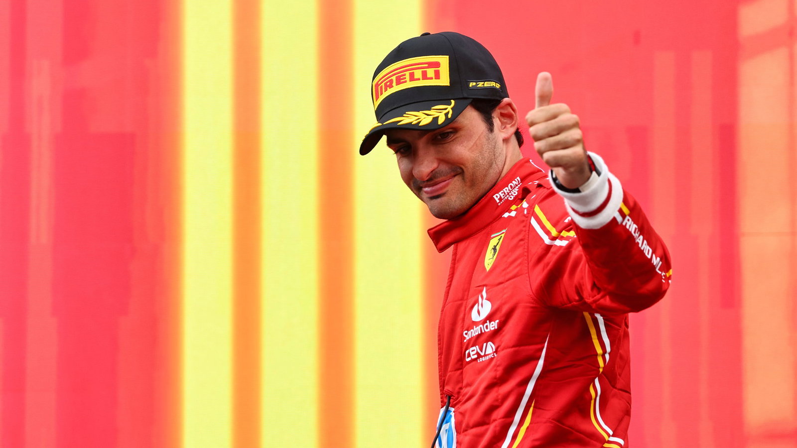 Carlos Sainz celebrates a podium in Austria 