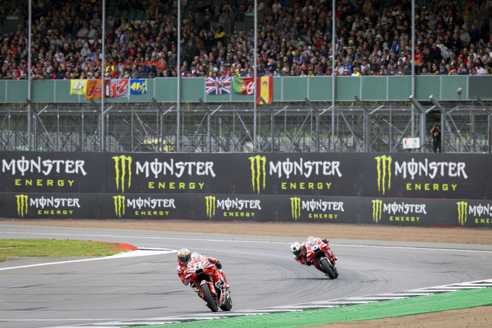 Enea Bastianini leads Jorge Martin, 2024 MotoGP British Grand Prix. Credit: Gold and Goose.