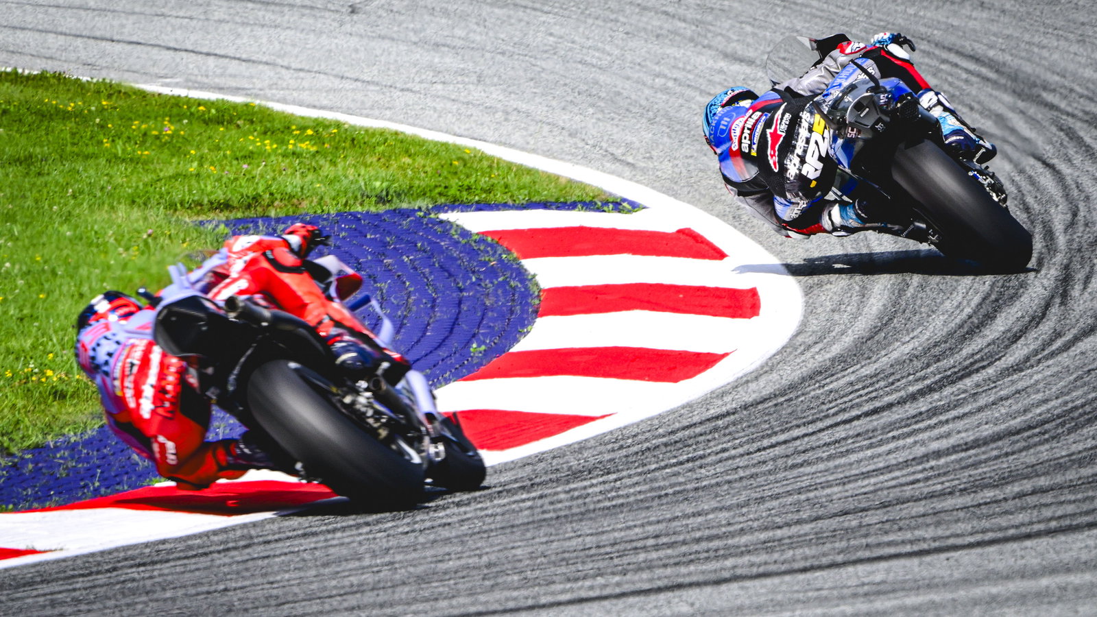 Raul Fernandez leads Marc Marquez, 2024 MotoGP Austrian Grand Prix. Credit: Gold and Goose.