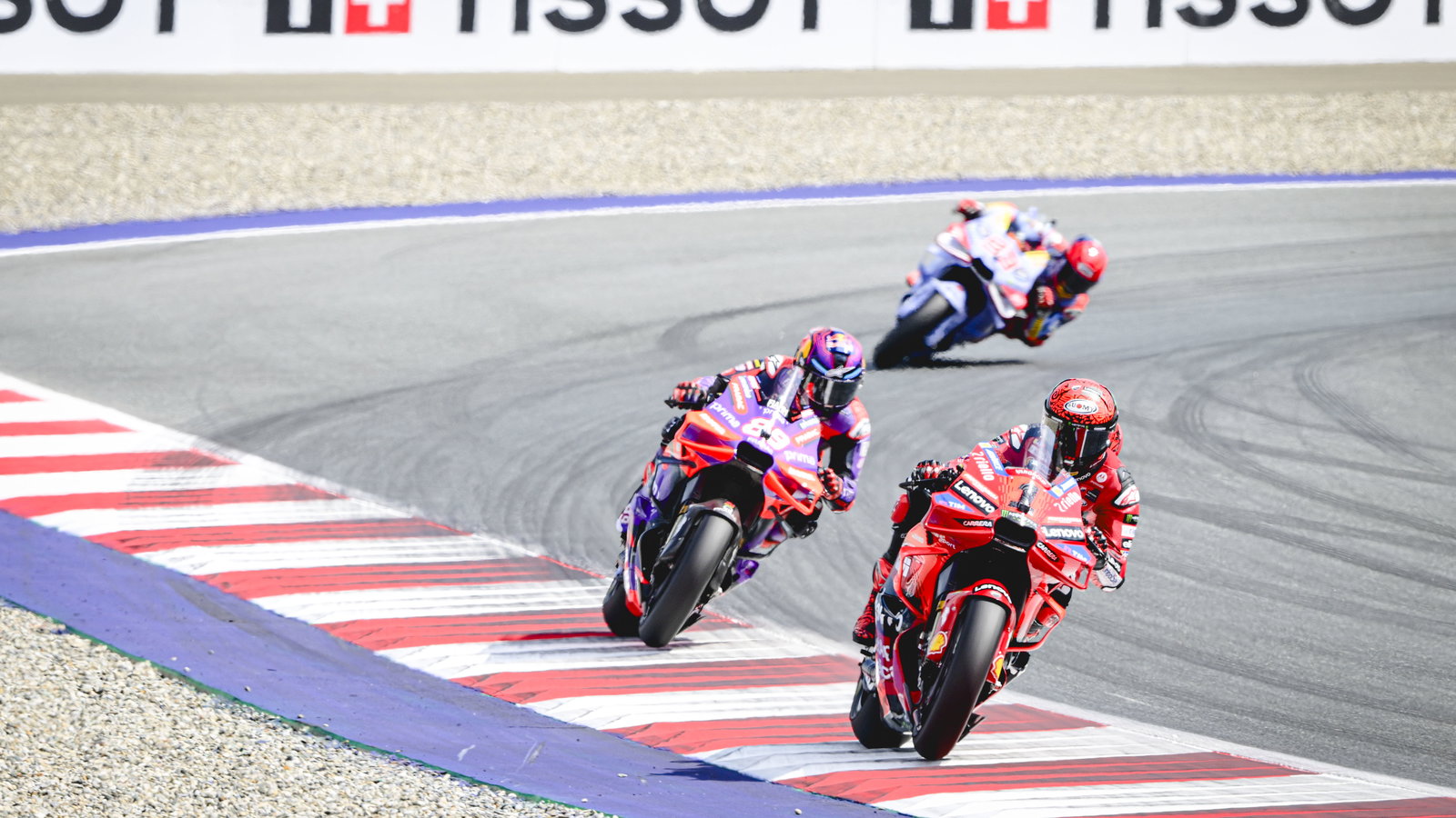 Francesco Bagnaia leads Jorge Martin, Marc Marquez, 2024 MotoGP Austrian Grand Prix. Credit: Gold and Goose.