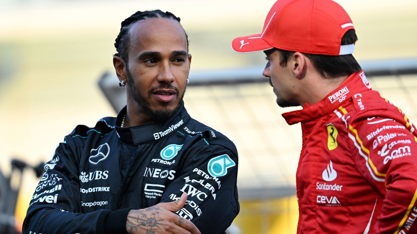 Lewis Hamilton with Charles Leclerc
