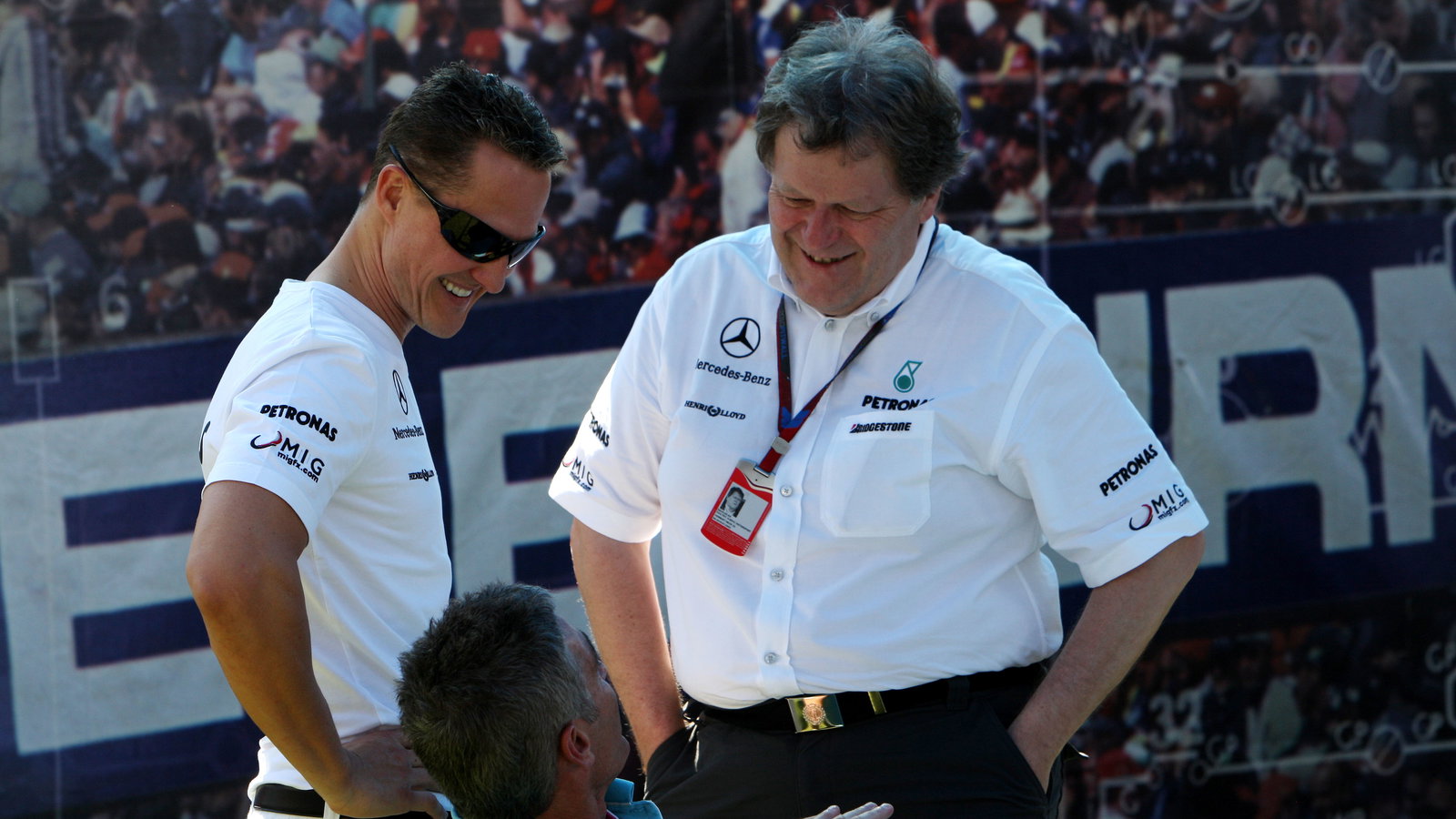 Michael Schumacher with Norbert Haug (Mercedes) and Mick Doohan
