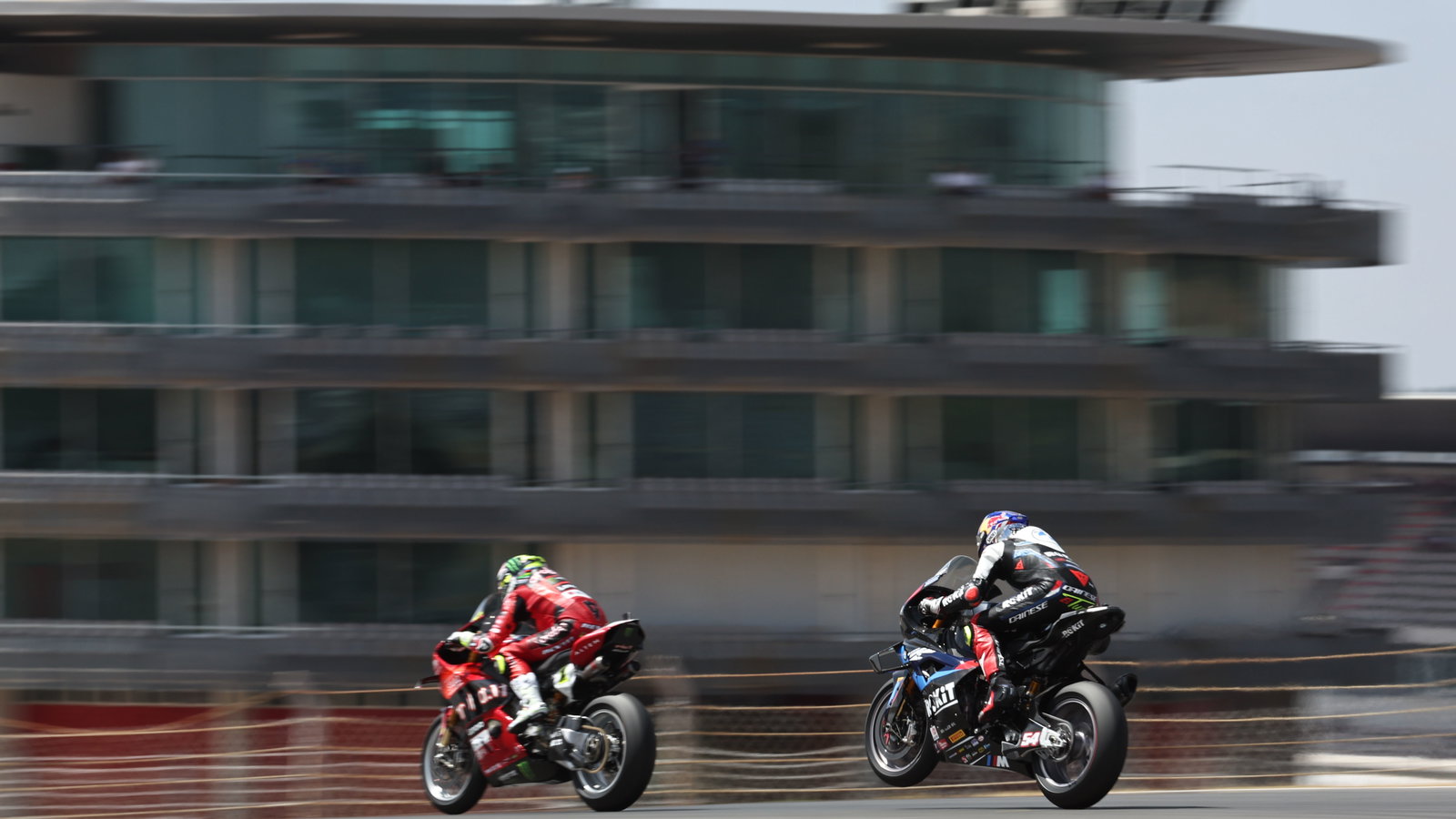 Alvaro Bautista, Toprak Razgatlioglu, 2024 Portuguese WorldSBK. Credit: Gold and Goose.