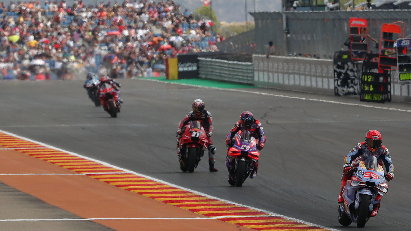 Marc Marquez leads Jorge Martin, Pedro Acosta, 2024 MotoGP Aragon Grand Prix. Credit: Gold and Goose.