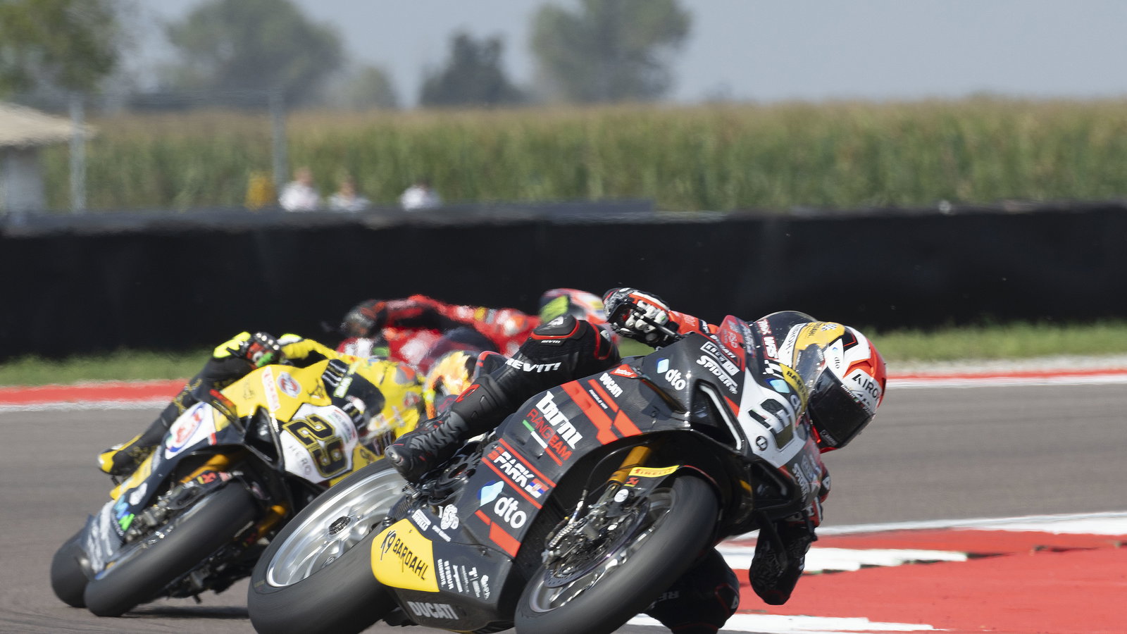 Danilo Petrucci leads Andrea Iannone, 2024 Italian WorldSBK. - Gold and Goose.