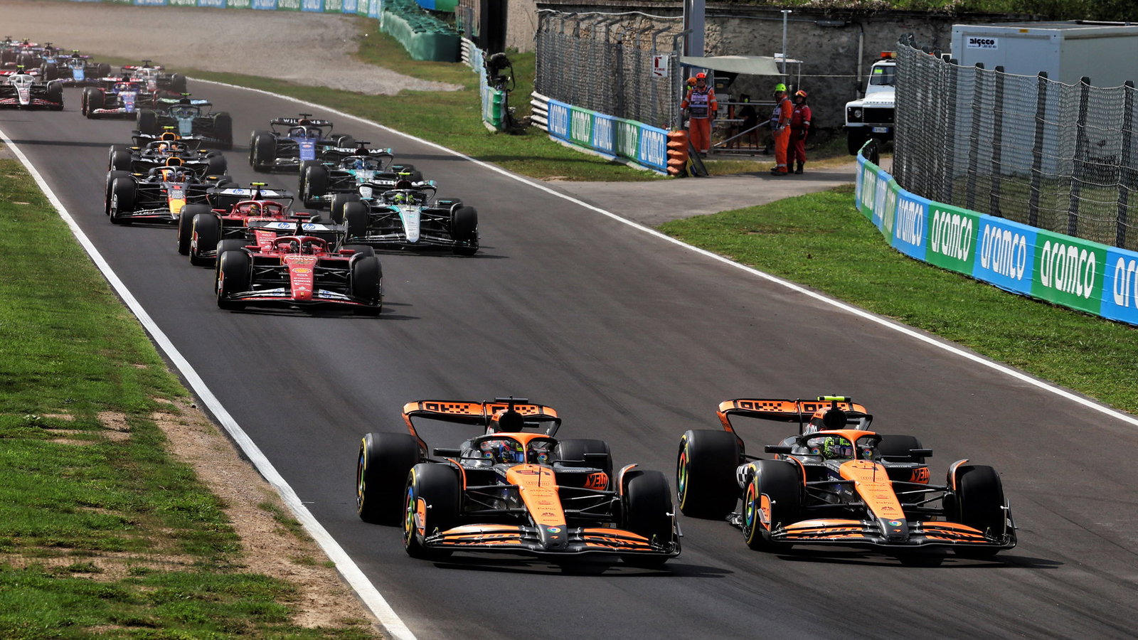 Oscar Piastri and Lando Norris do battle on the first lap