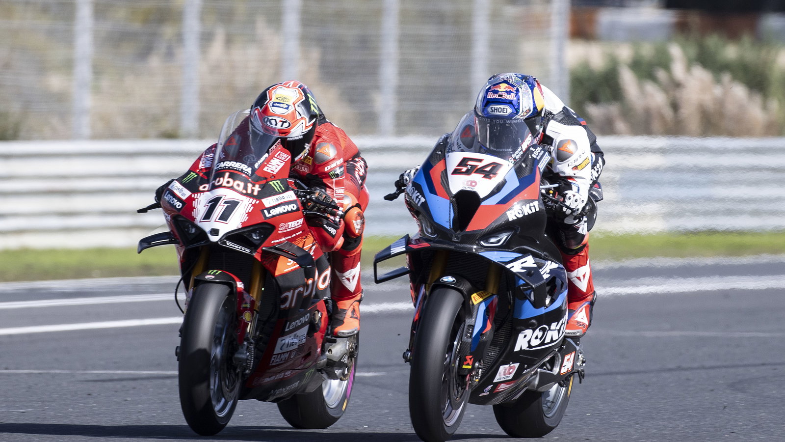 Toprak Razgatlioglu, Nicolo Bulega, 2024 Estoril WorldSBK. Credit: Gold and Goose.