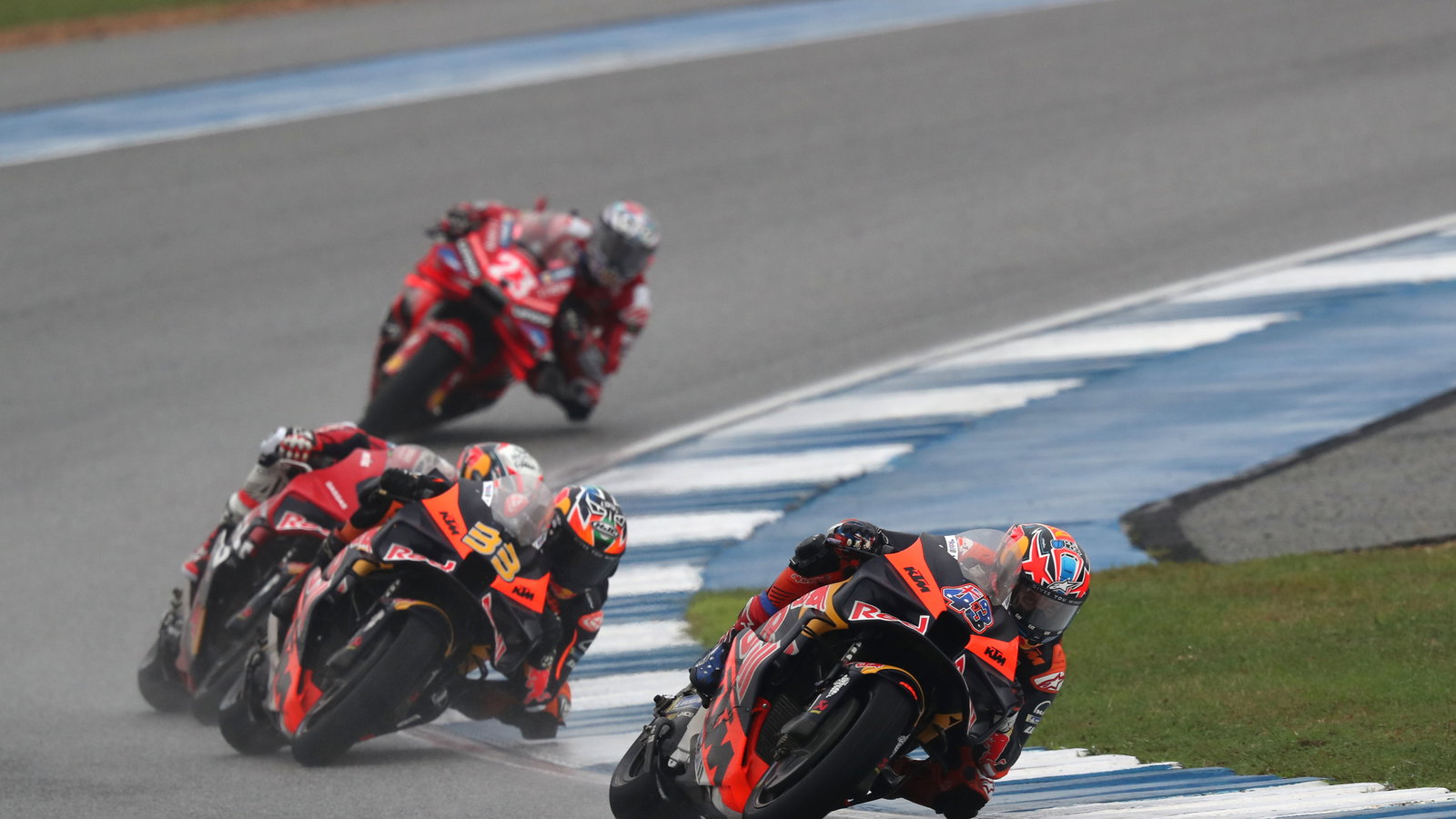 Jack Miller leads Brad Binder, 2024 MotoGP Thai Grand Prix. Credit: Gold and Goose.