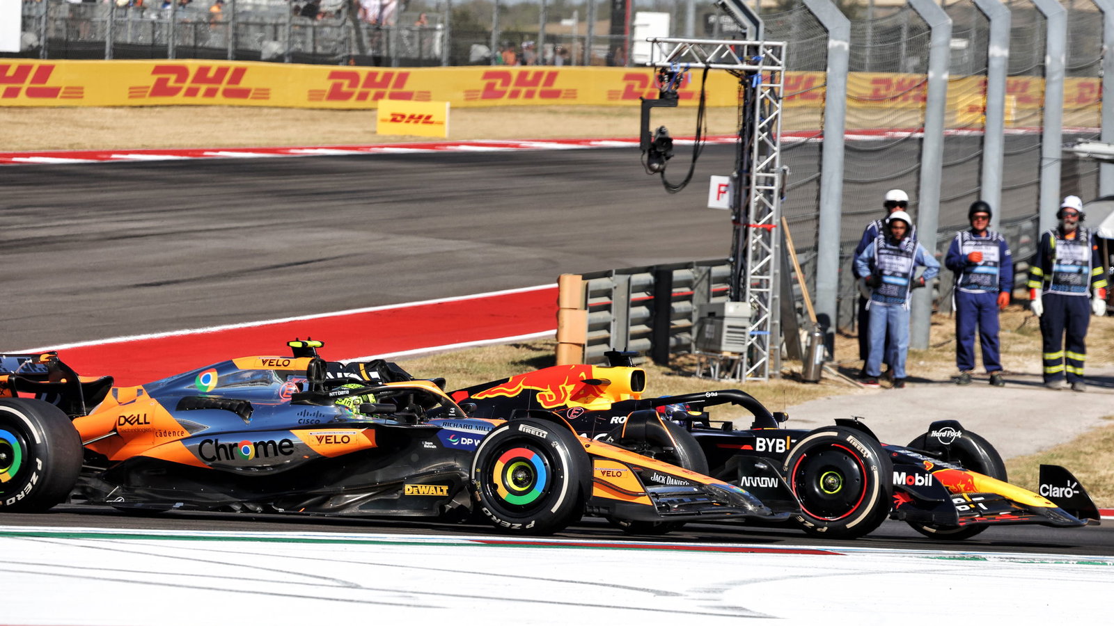 Lando Norris and Max Verstappen battle for third