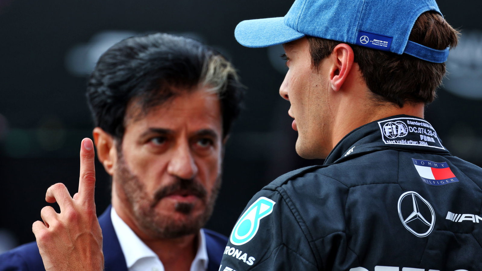 George Russell and FIA president Mohammed Ben Sulayem