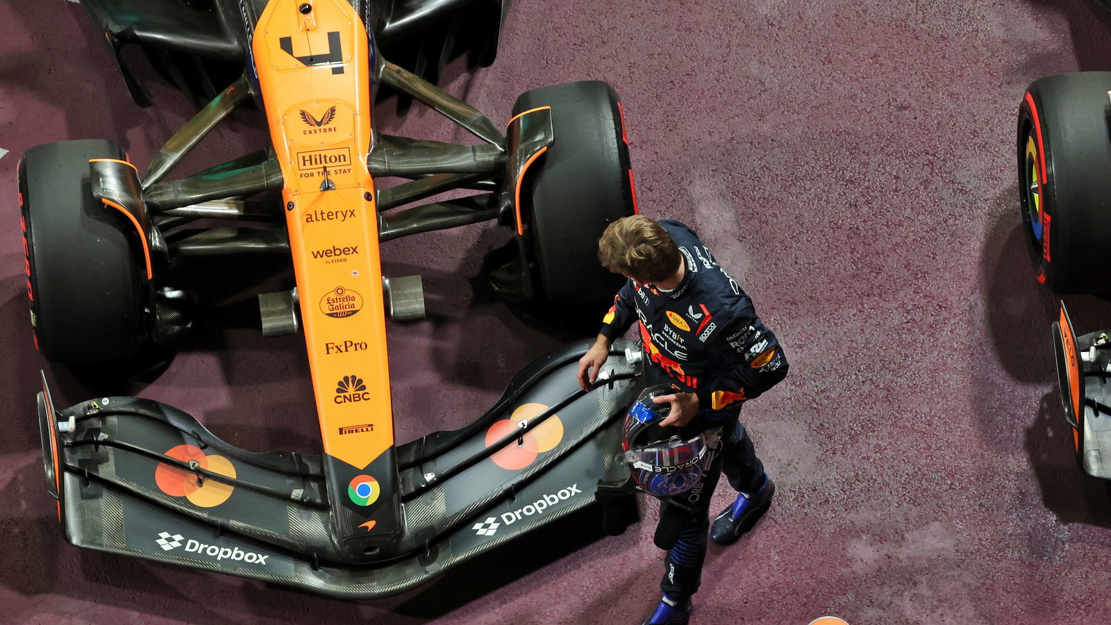 Max Verstappen checks out Lando Norris' McLaren 