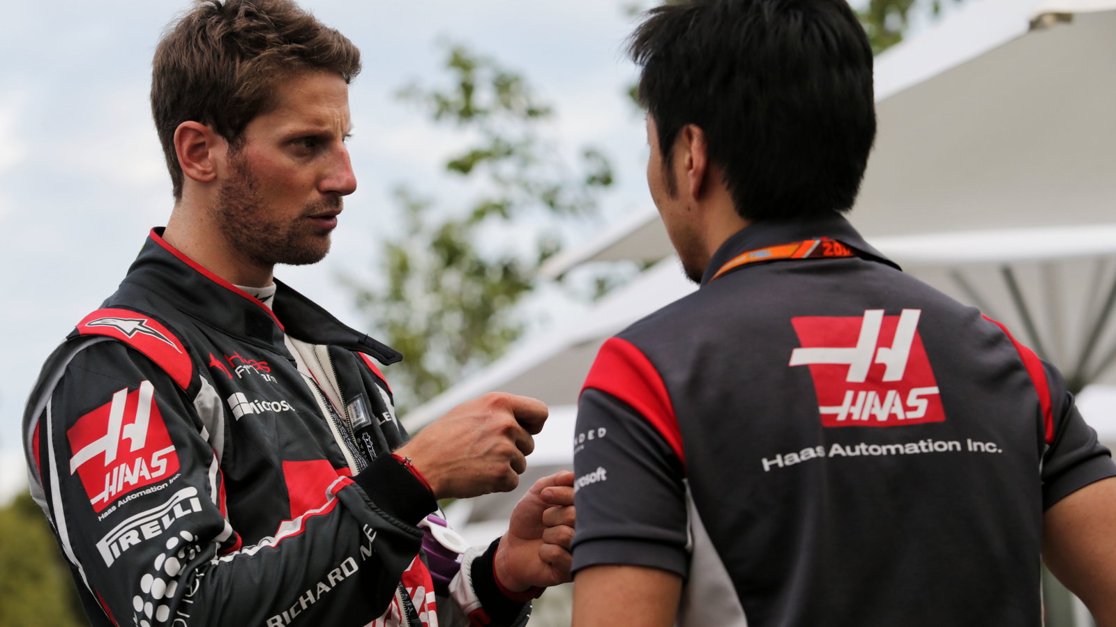 Romain Grosjean with Ayao Komatsu