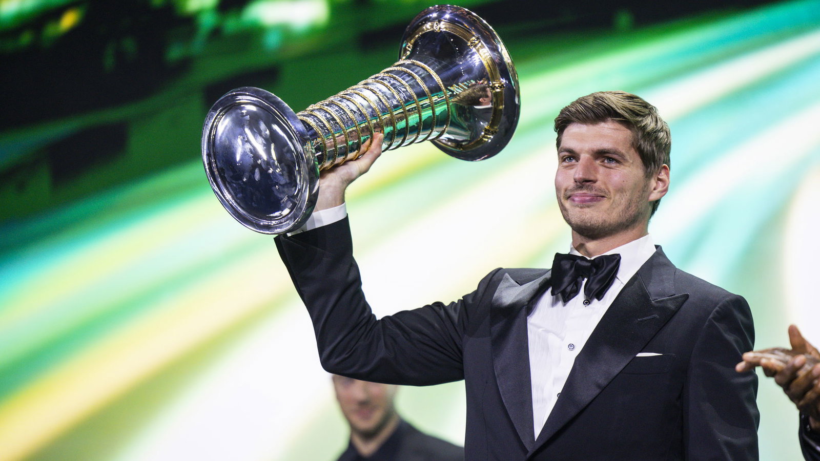 Max Verstappen collects his F1 championship trophy