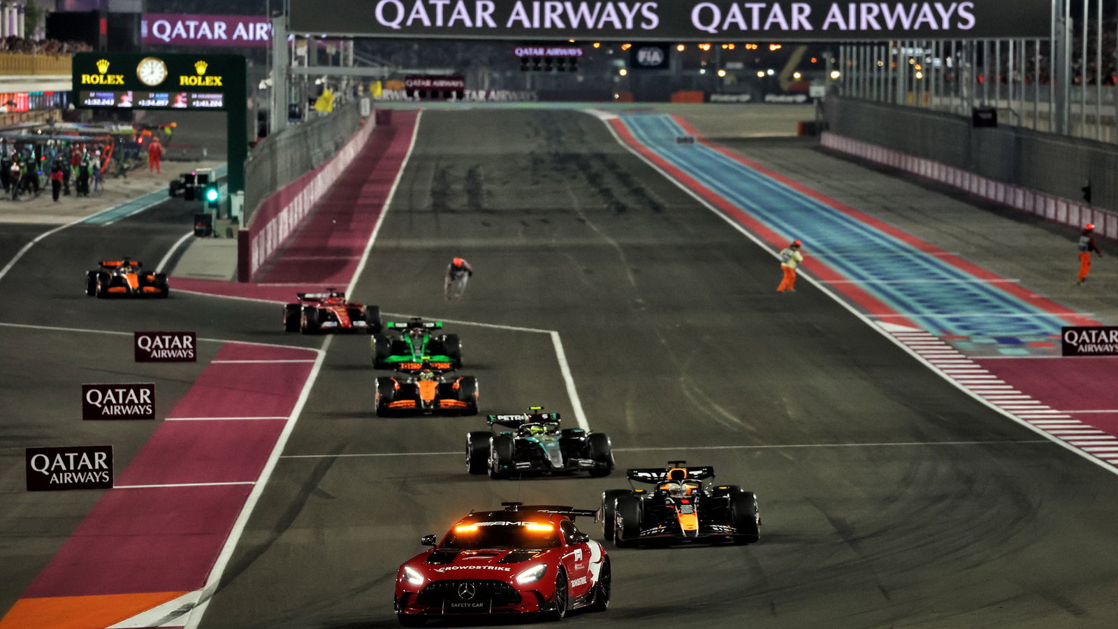 Max Verstappen leads the pack under the Safety Car