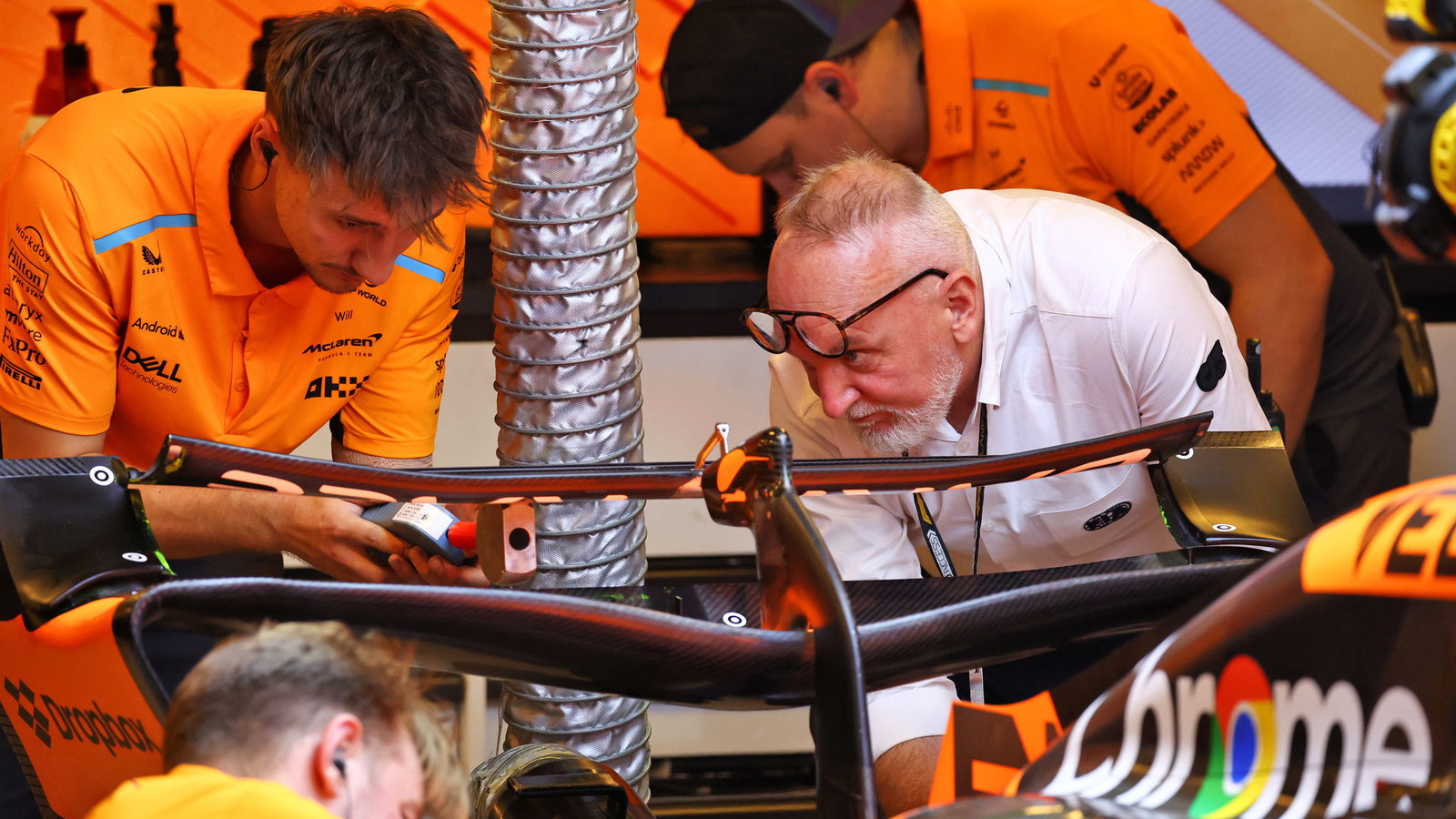 FIA inspection on McLaren's rear wing