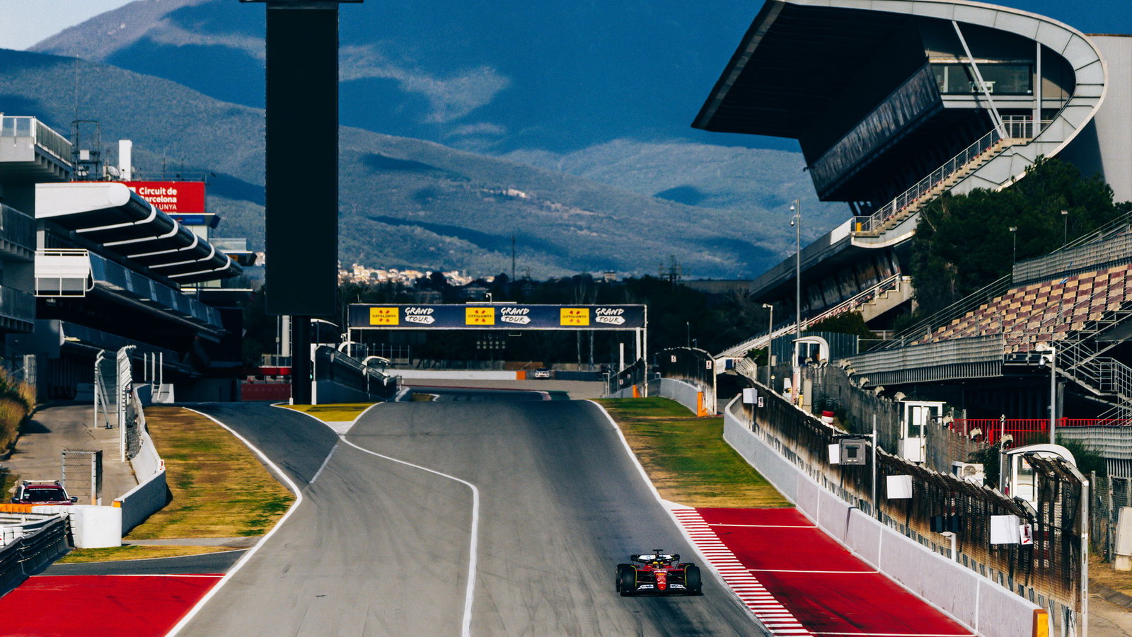 Lewis Hamilton drives down Barcelona's main straight