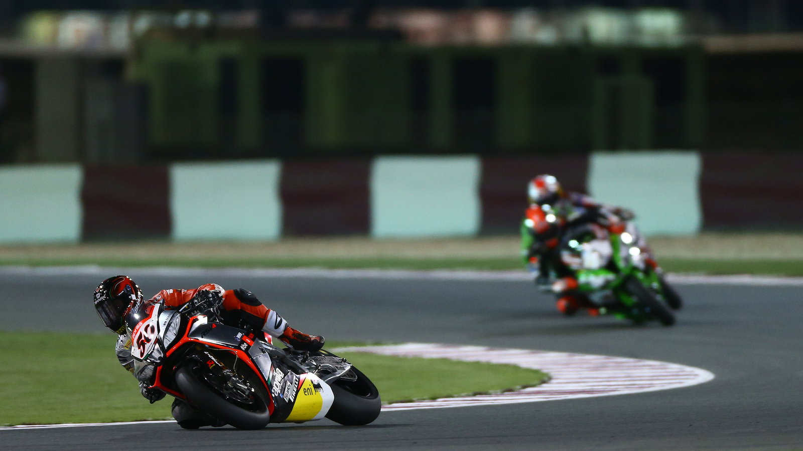Sylvain Guintoli leads WorldSBK Race 2, 2014 Qatar WorldSBK. Credit: Gold and Goose.