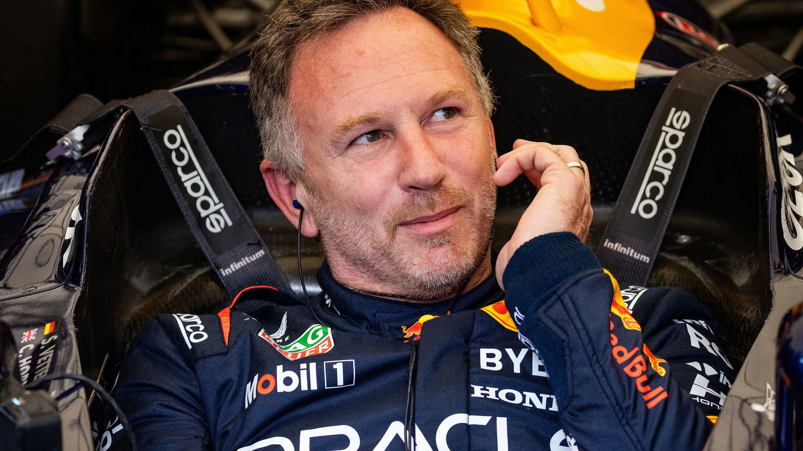 Christian Horner behind the wheel of one of Red Bull's F1 cars