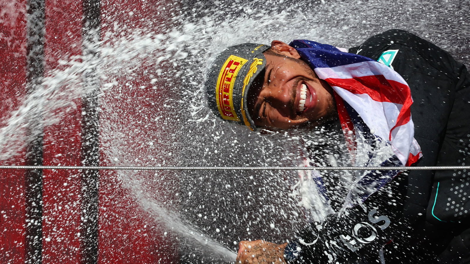 Lewis Hamilton celebrates winning last year's British Grand Prix