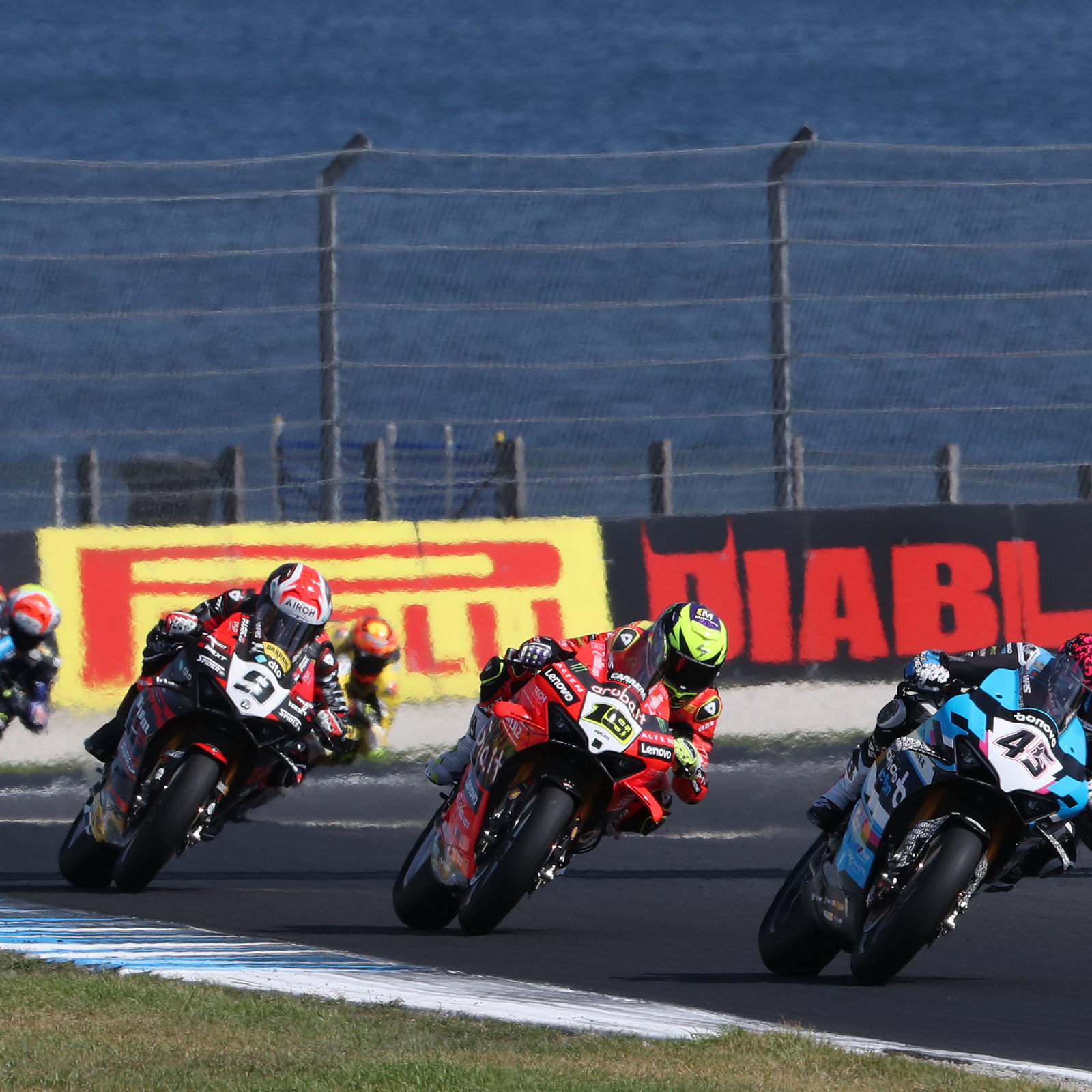 Scott Redding leads Alvaro Bautista, Danilo Petrucci, 2025 Australian WorldSBK. Credit: Gold and Goose.