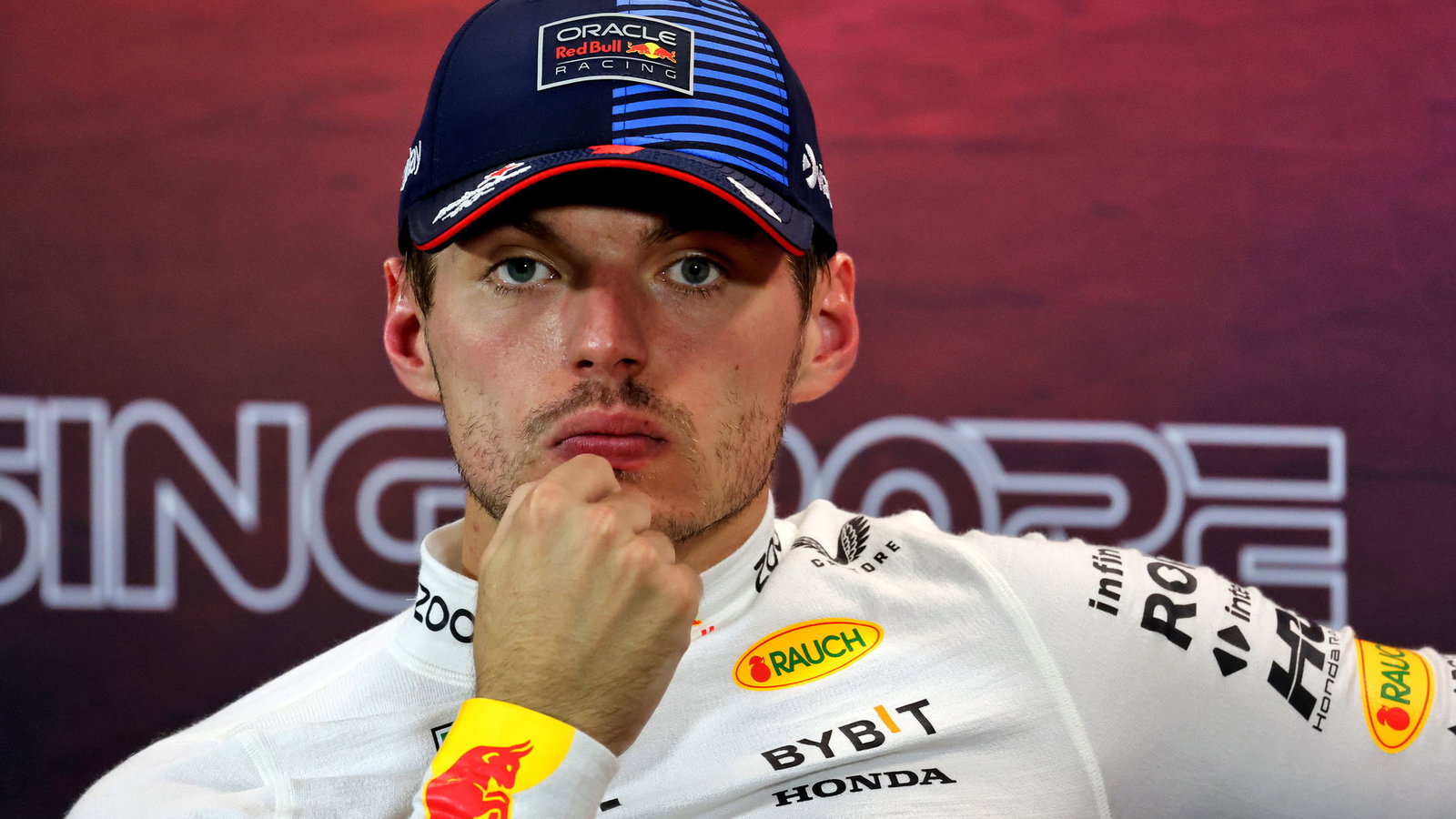 Max Verstappen was punished for swearing in a news conference in Singapore