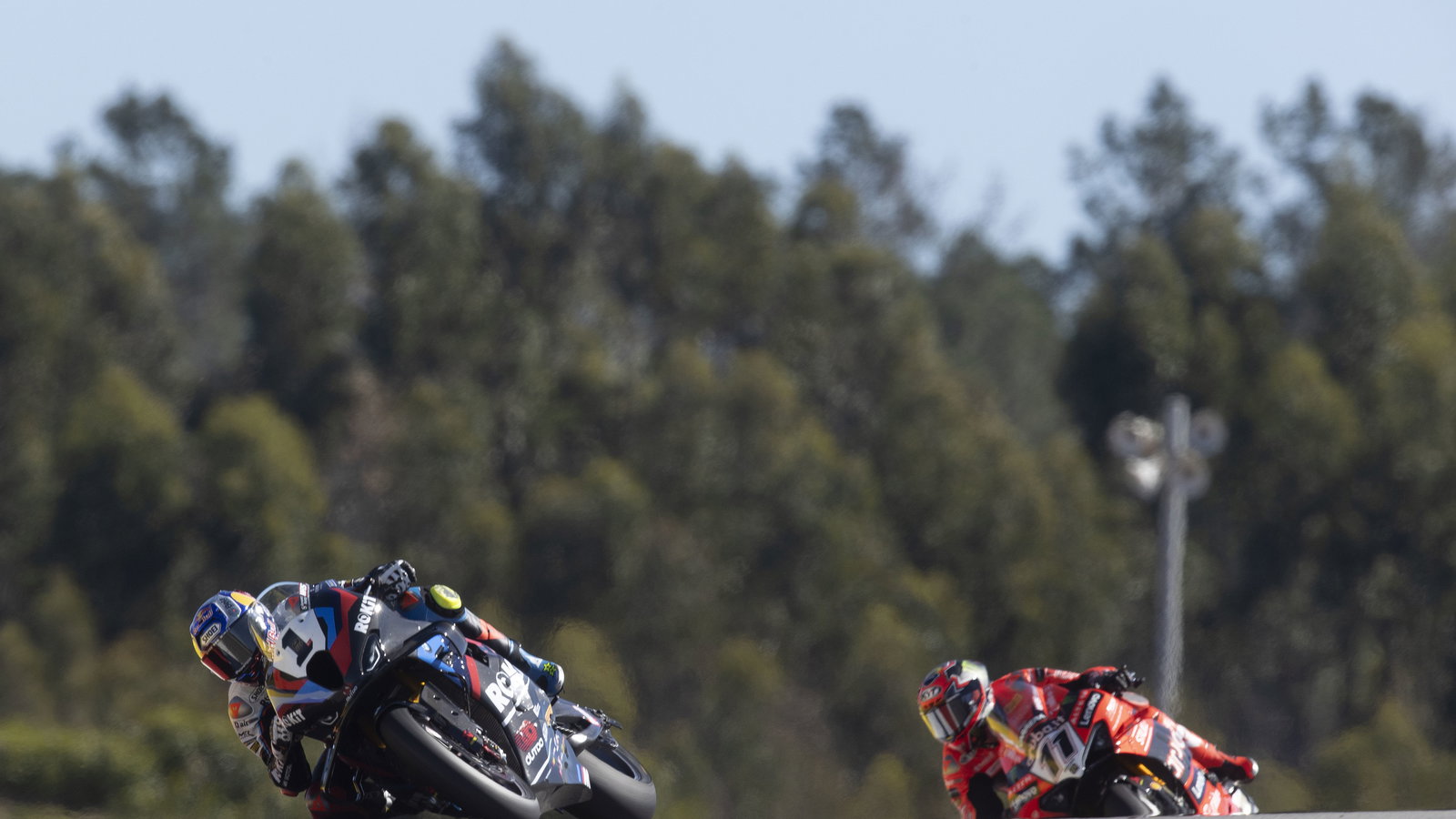 Toprak Razgatlioglu, Nicolo Bulega, 2025 Portuguese WorldSBK, parc ferme. Credit: Gold and Goose.