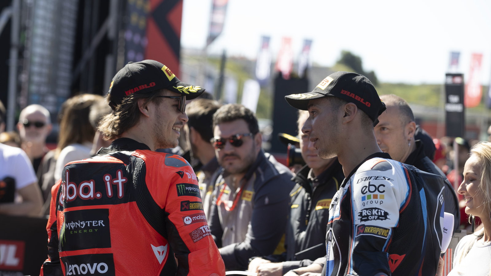Nicolo Bulega, Toprak Razgatlioglu, 2025 Portuguese WorldSBK, parc ferme. Credit: Gold and Goose.
