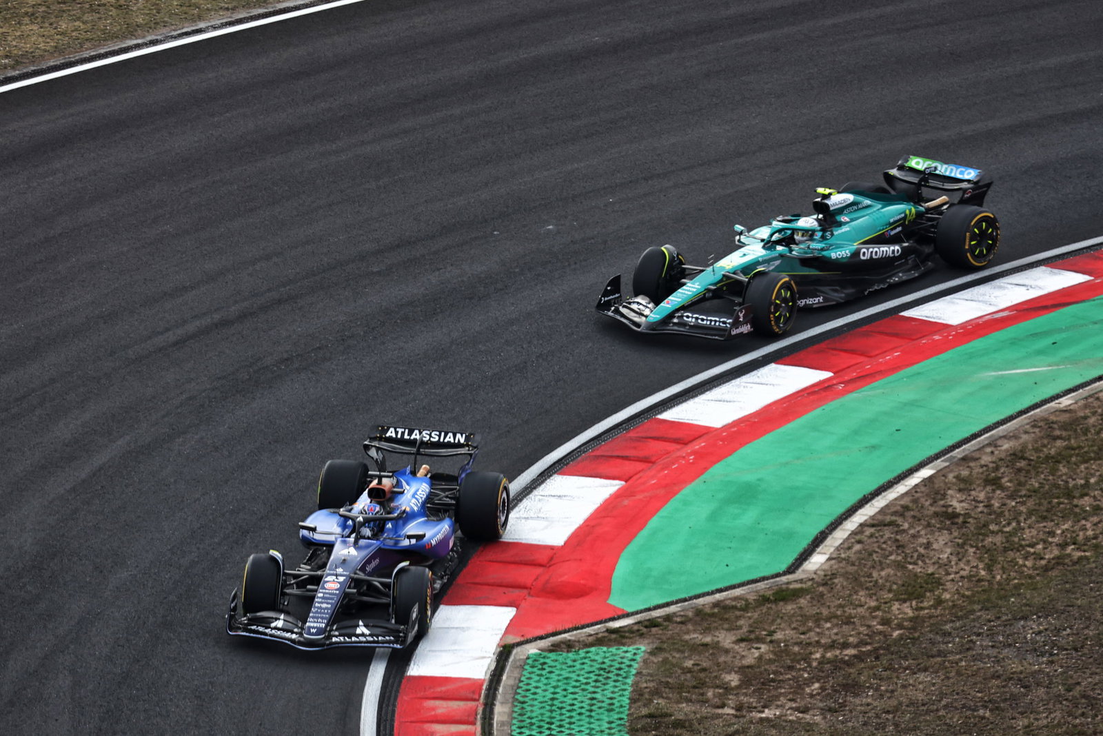 Alex Albon leads Fernando Alonso 
