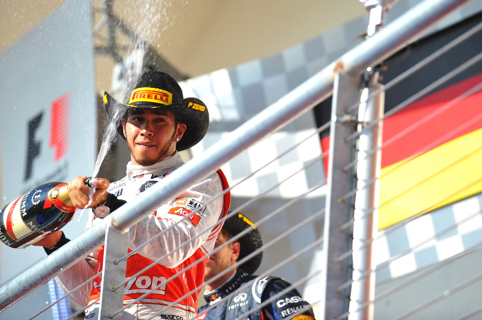 Lewis Hamilton celebrates a first win in Texas