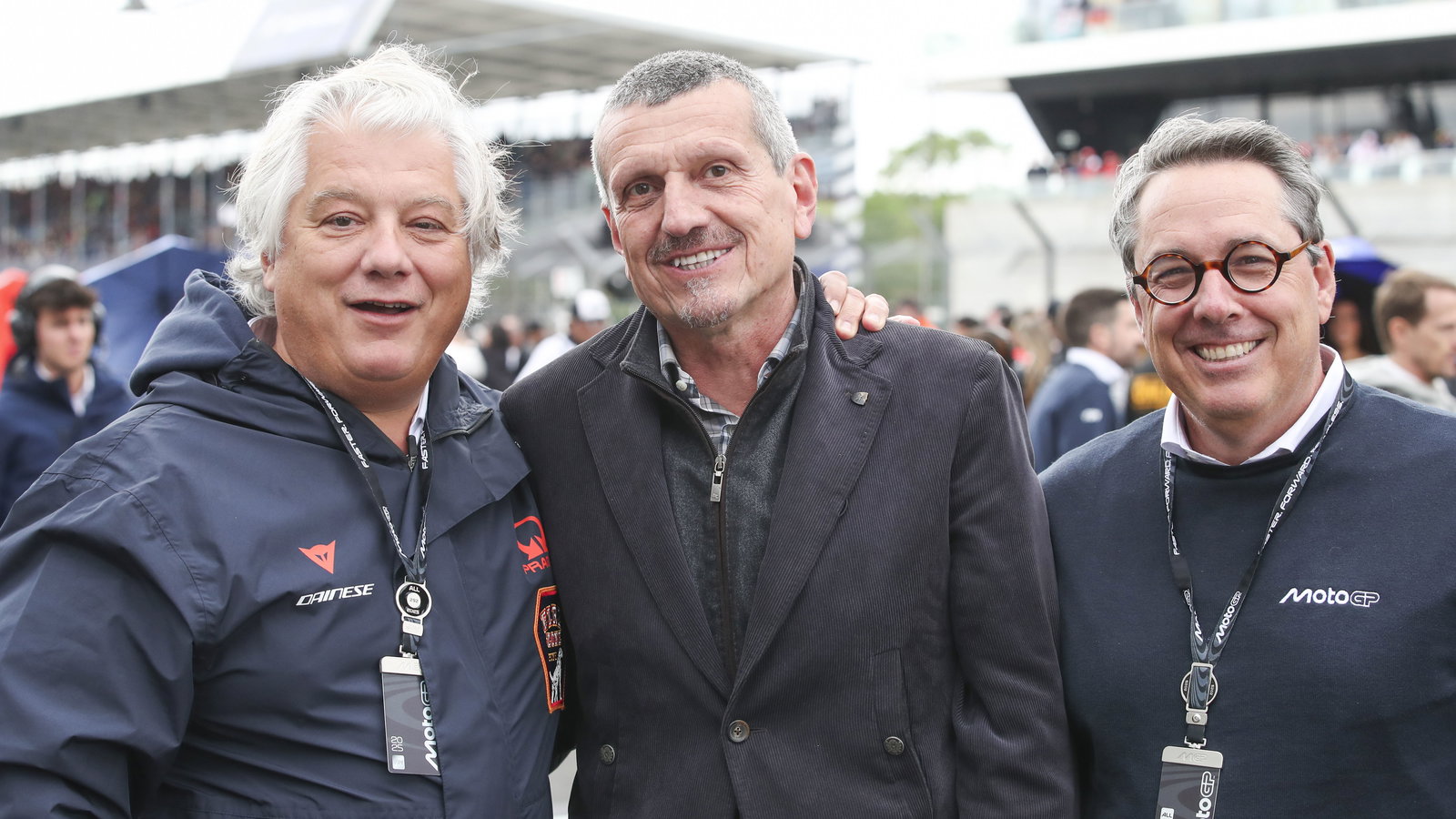 Guenther Steiner (centre), Dorna CCO Dan Rossomondo (right) 2025 British MotoGP