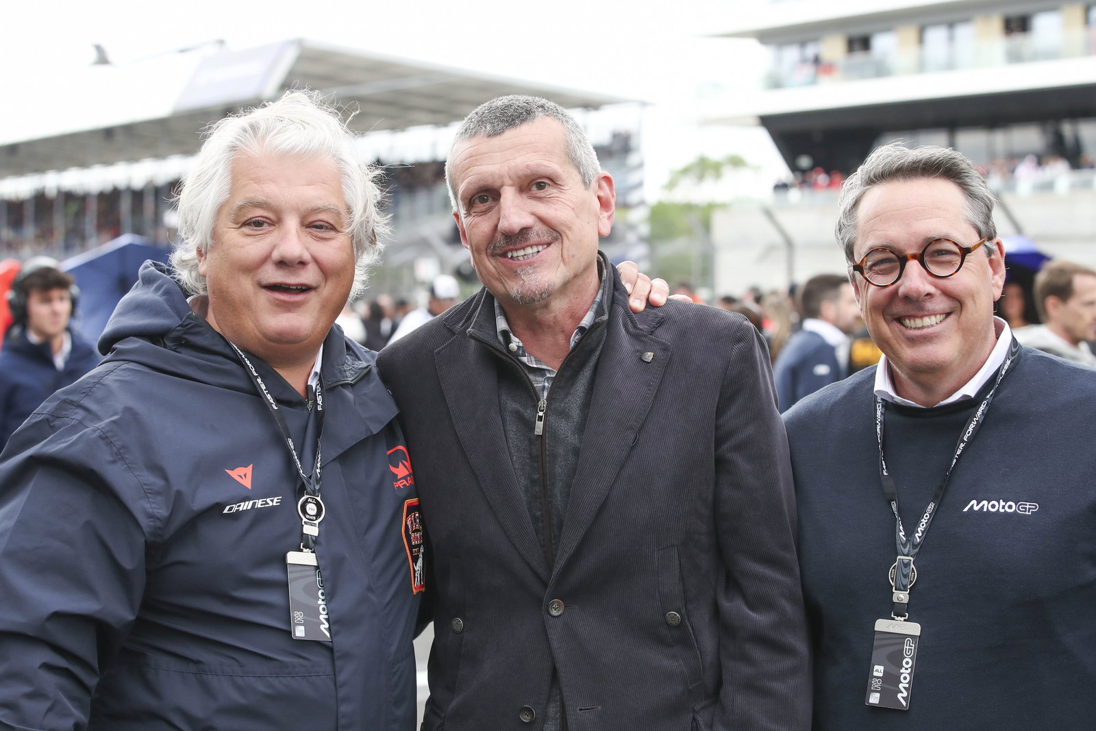 Guenther Steiner (centre), Dorna CCO Dan Rossomondo (right) 2025 British MotoGP