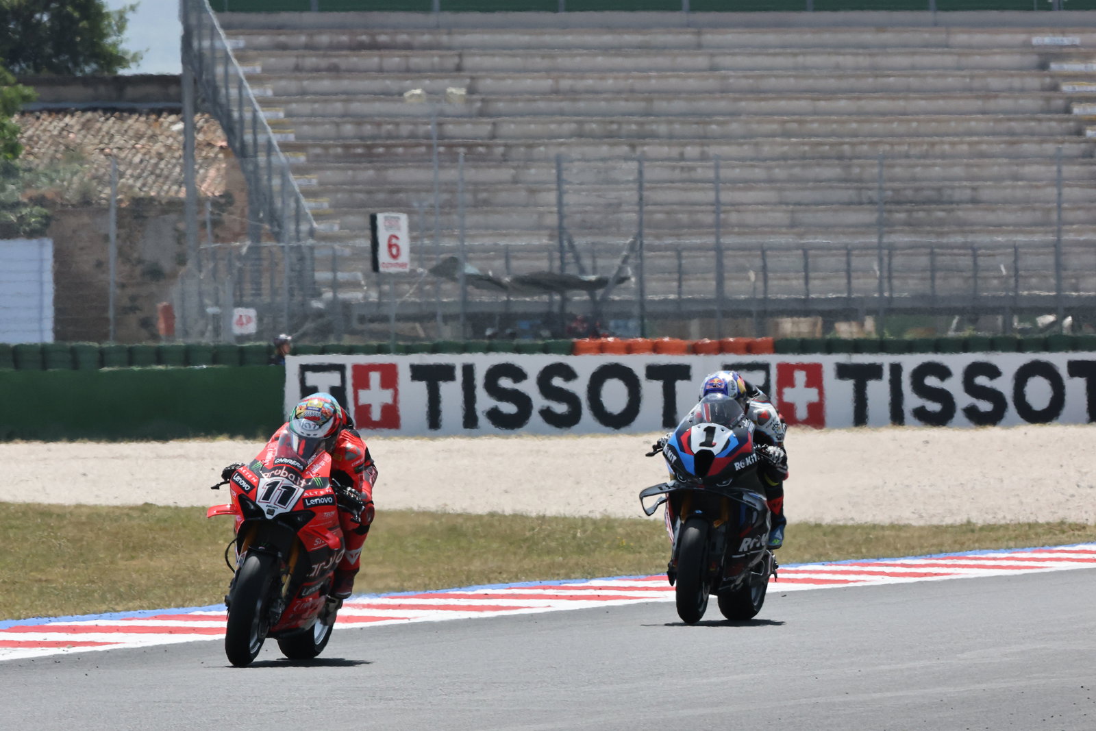 Nicolo Bulega leads Toprak Razgatlioglu, 2025 Emilia-Romagna WorldSBK. Credit: Gold and Goose.