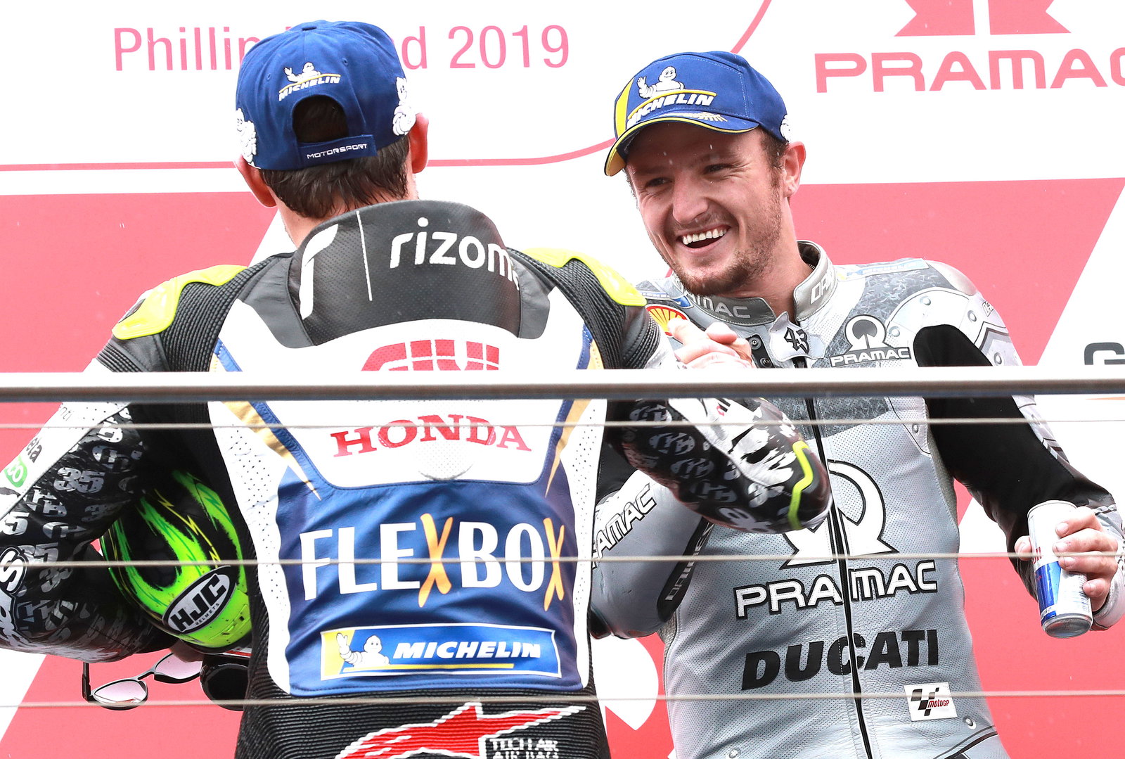 Jack Miller, Cal Crutchlow, 2019 MotoGP Australian Grand Prix, podium. Credit: Gold and Goose.