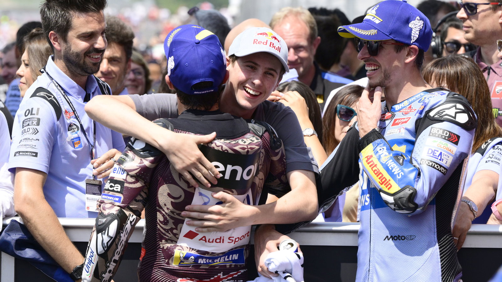Marc Marquez, Max Quiles embrace in parc ferme, 2025 MotoGP Italian Grand Prix. Credit: Gold and Goose.