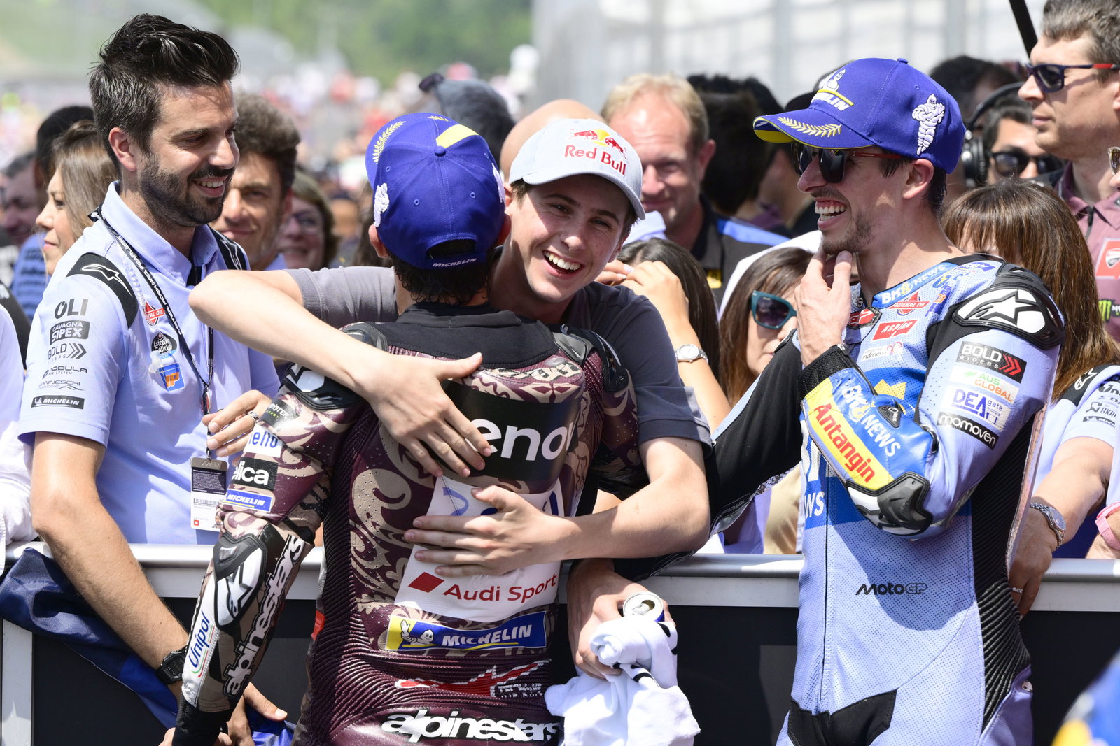 Marc Marquez, Max Quiles embrace in parc ferme, 2025 MotoGP Italian Grand Prix. Credit: Gold and Goose.