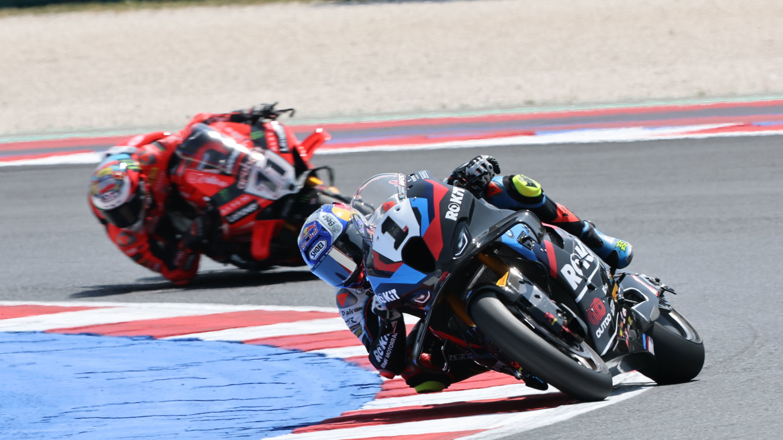 Toprak Razgatlioglu leads Nicolo Bulega, 2025 Emilia-Romagna WorldSBK. Credit: Gold and Goose.