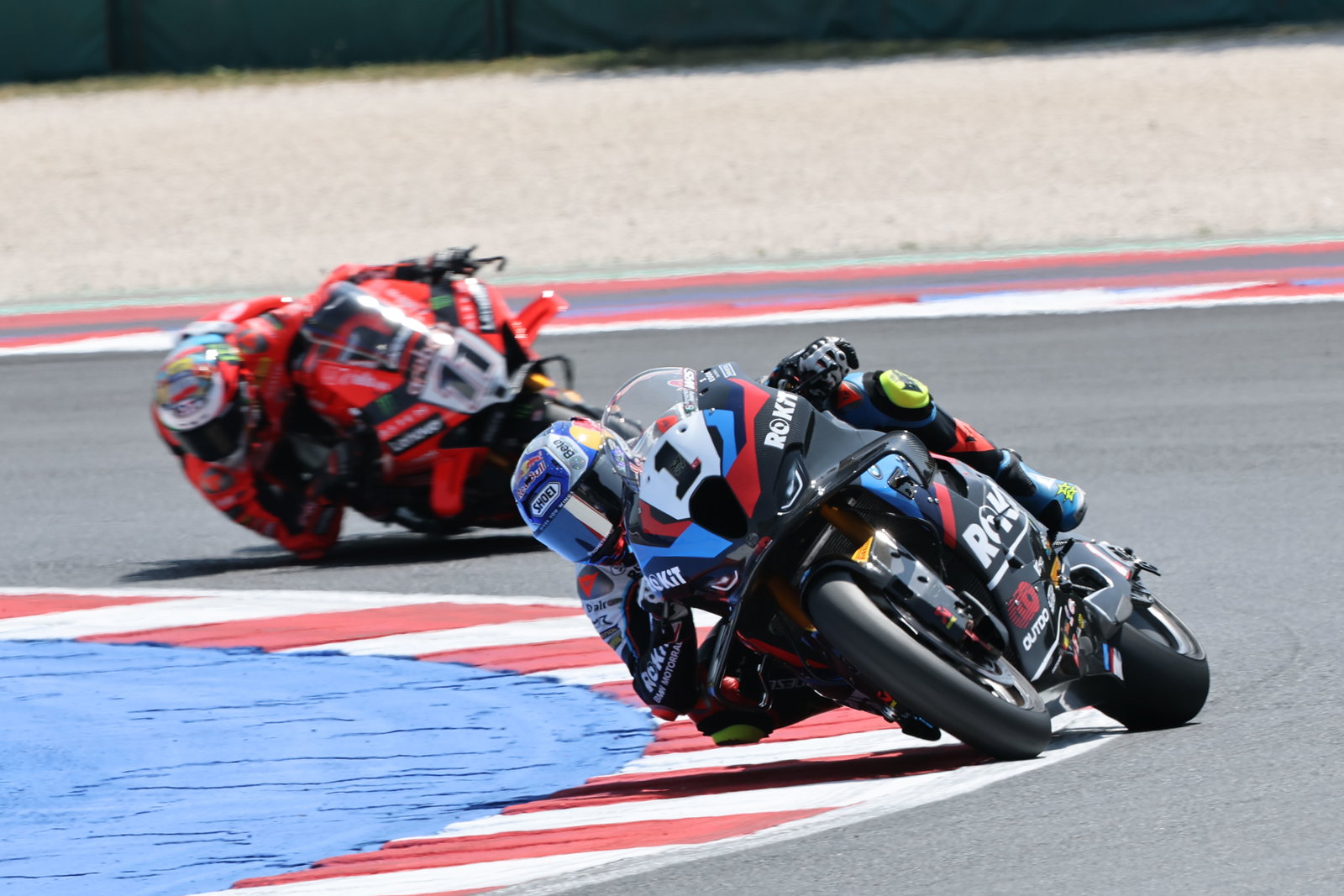 Toprak Razgatlioglu leads Nicolo Bulega, 2025 Emilia-Romagna WorldSBK. Credit: Gold and Goose.
