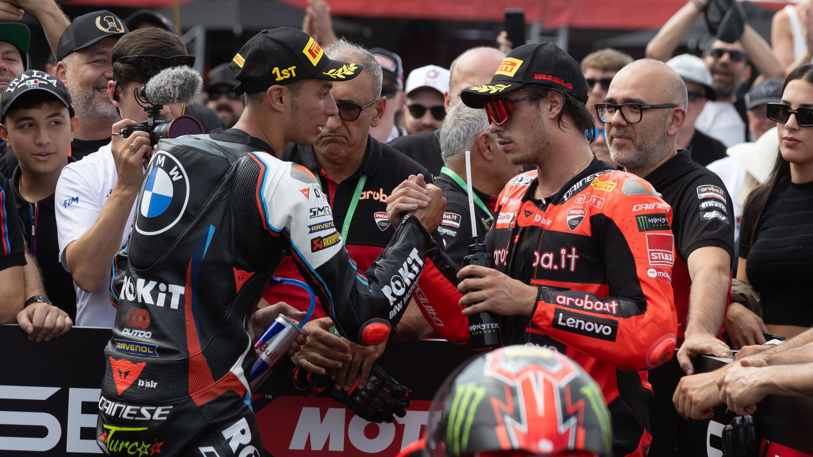Toprak Razgatlioglu, Nicolo Bulega, 2025 UK WorldSBK, parc ferme. Credit: Gold and Goose.