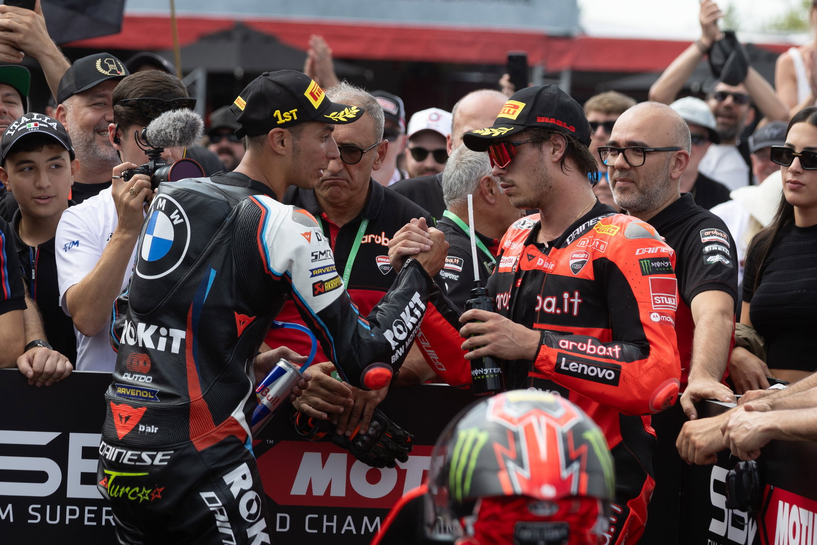 Toprak Razgatlioglu, Nicolo Bulega, 2025 UK WorldSBK, parc ferme. Credit: Gold and Goose.