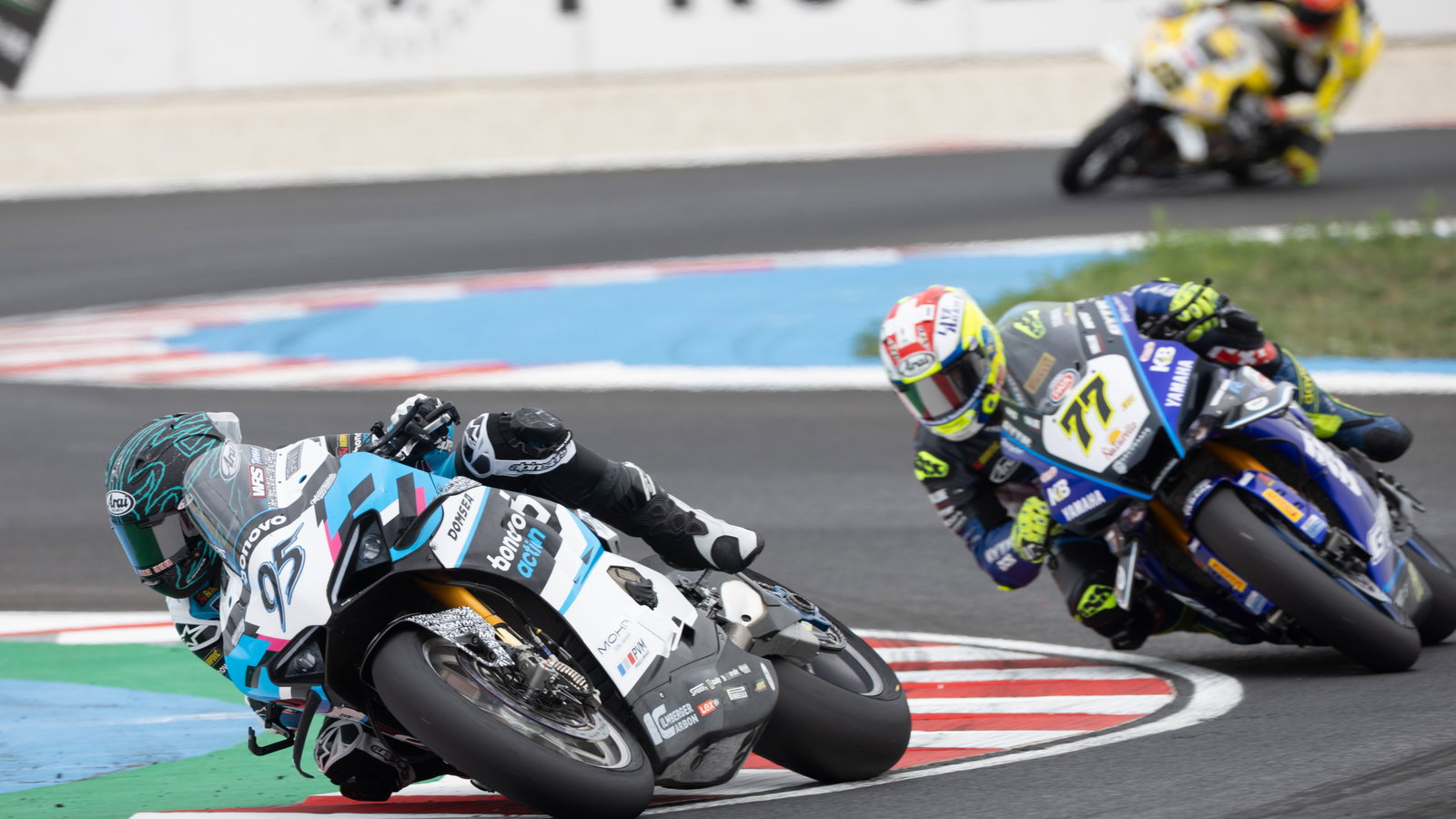 Tarran Mackenzie leads Dominique Aegerter, 2025 Hungarian WorldSBK. Credit: Gold and Goose.