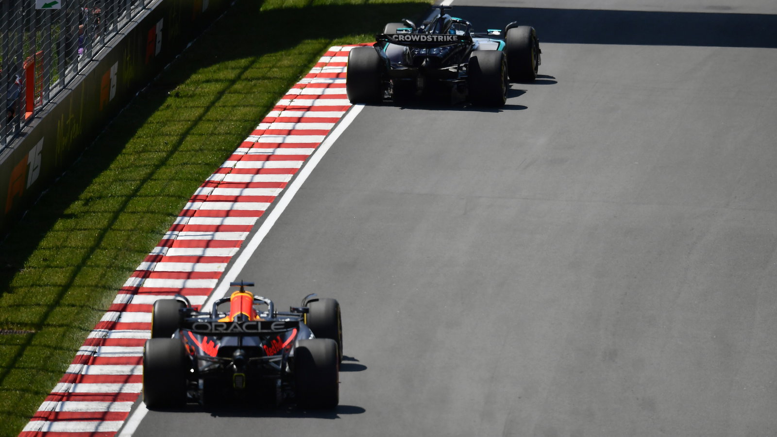 George Russell and Max Verstappen on track at the Canadian GP