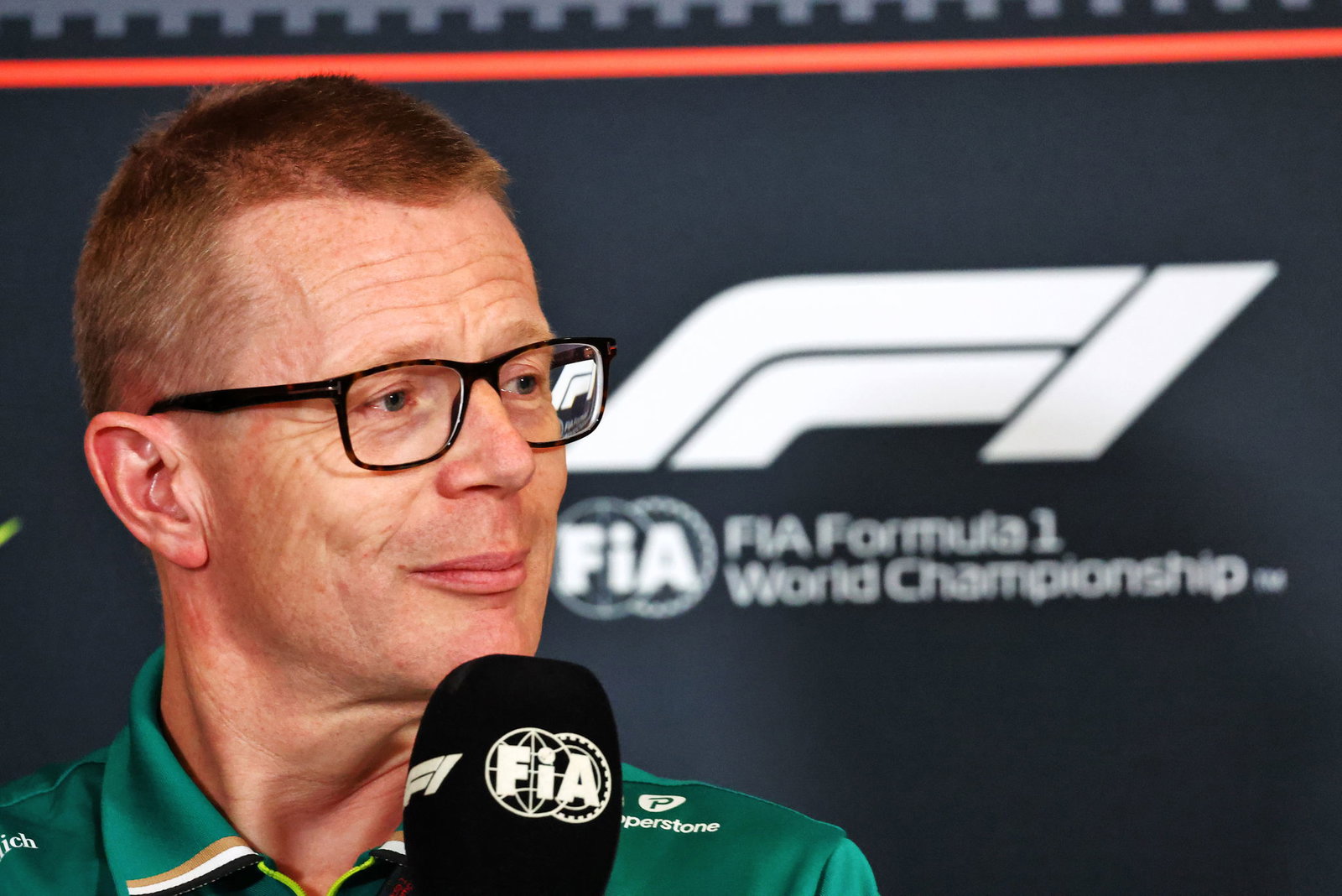 Cowell downplayed links to Russell