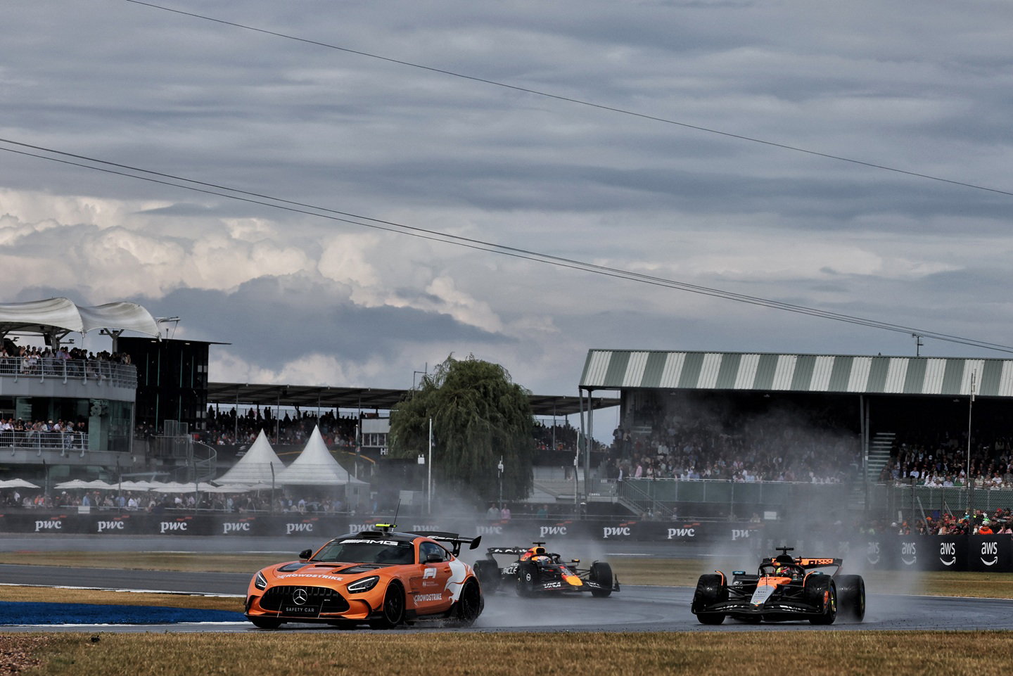 Safety car leads the field