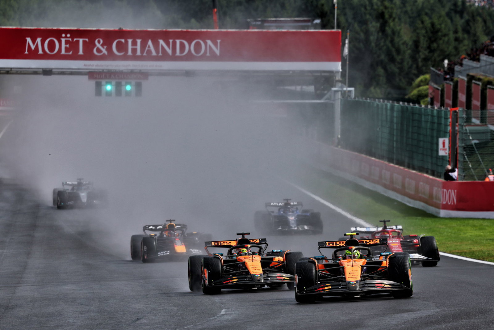 Lando Norris leads the field at the rolling start