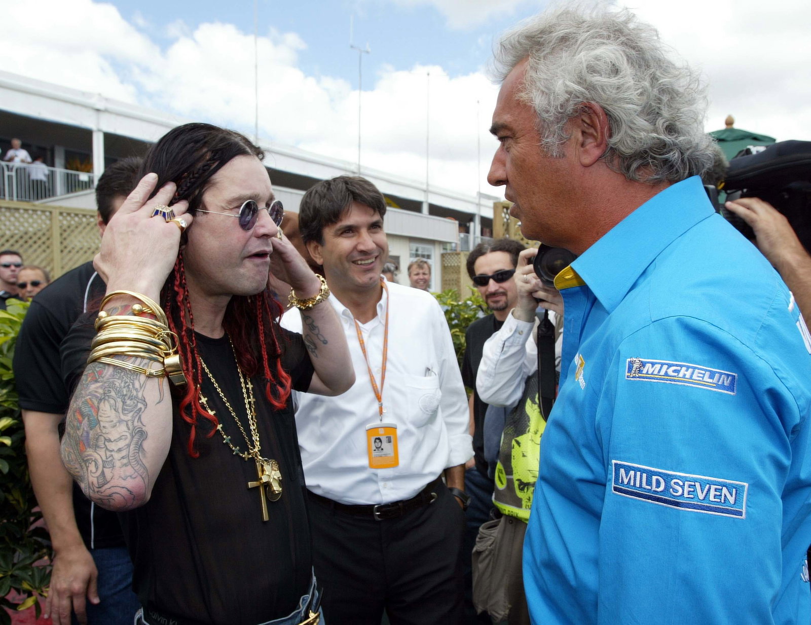 Ozzy Osbourne with Flavio Briatore in 2003